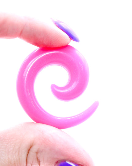 These Pink Acrylic Spiral Taper Earrings are a stylish and low-maintenance option for stretched ears. The sleek spiral design adds visual interest while remaining lightweight and easy to wear. Perfect for everyday use or to enhance your alt aesthetic, these tapers offer a bold yet classic look.