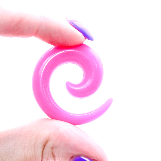 These Pink Acrylic Spiral Taper Earrings are a stylish and low-maintenance option for stretched ears. The sleek spiral design adds visual interest while remaining lightweight and easy to wear. Perfect for everyday use or to enhance your alt aesthetic, these tapers offer a bold yet classic look.