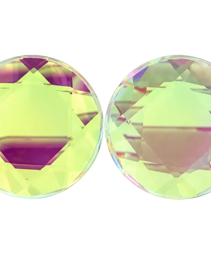 Two round, faceted clear glass plugs with an iridescent, holographic finish, one standing vertically and the other lying horizontally, on a white background.