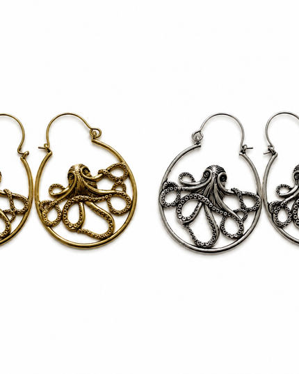 Two pairs of octopus-shaped hoop earrings on a plain white background, one in antique gold and one in antique silver.