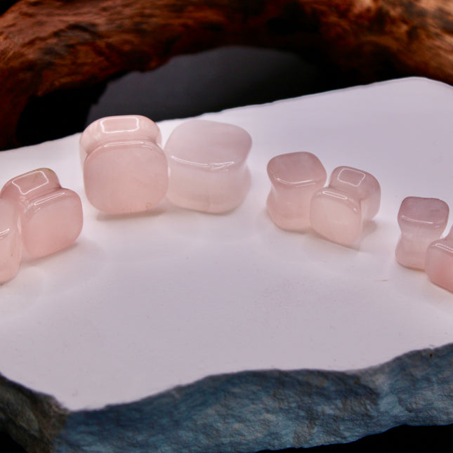These Rose Quartz Square Stone Plugs combine the soft, loving energy of rose quartz with a bold geometric shape—offering both comfort and beauty for your everyday crystal jewelry.