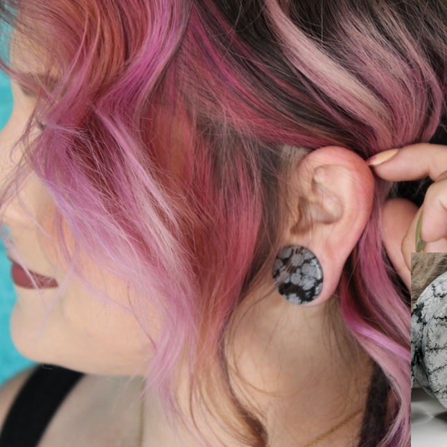 These Snowflake Obsidian Double Flared Plugs feature a smooth, polished surface with natural gray-white crystal "snowflakes" scattered across a rich black volcanic glass base. The double flare ensures a secure, comfortable fit for stretched ears without the need for O-rings. Each pair is uniquely patterned, showcasing the stone’s natural beauty and grounding energy. Durable and stylish, these plugs add a bold yet refined touch to any stretched ear jewelry collection.