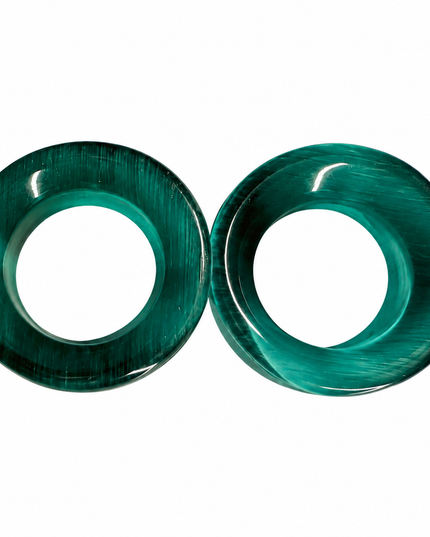 Two oval green glass gauges with a glossy, polished finish and natural band texture, displayed side-by-side on a solid white background.