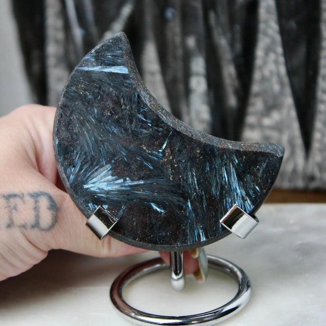 Astrophyllite Moon on Metal Stand – Firework Crystal Display Piece, Rare Stone Carving for Celestial Home or Office Decor