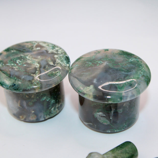 These Grade A Moss Agate Single Flare Plugs offer both comfort and crystal energy in one elegant pair. Ideal for nature lovers, energy workers, or anyone who appreciates the earthy charm of natural stone jewelry.