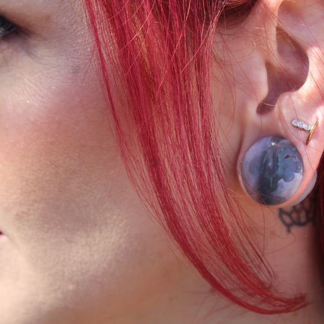 These Grade A Moss Agate Single Flare Plugs offer both comfort and crystal energy in one elegant pair. Ideal for nature lovers, energy workers, or anyone who appreciates the earthy charm of natural stone jewelry.