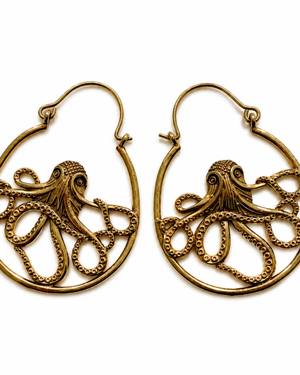 A pair of gold-toned teardrop hoop earrings featuring an intricate octopus design with detailed tentacles, set against a plain white background.