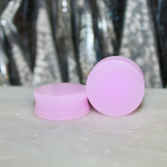 These Pink Agate Double Flare Plugs combine crystal healing with bold color and natural elegance—perfect for everyday wear or adding a soft, grounding energy to your stretched ear style.