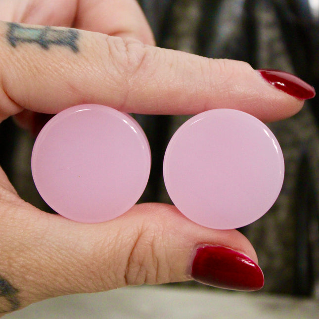 These Pink Agate Double Flare Plugs combine crystal healing with bold color and natural elegance—perfect for everyday wear or adding a soft, grounding energy to your stretched ear style.