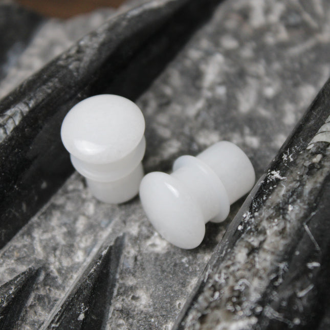 These White Quartz Single Flared Plugs combine subtle beauty with soothing energy—ideal for anyone seeking a minimalist look with meaningful crystal benefits.
