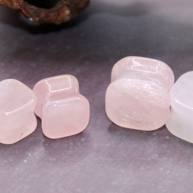 These Rose Quartz Square Stone Plugs combine the soft, loving energy of rose quartz with a bold geometric shape—offering both comfort and beauty for your everyday crystal jewelry.