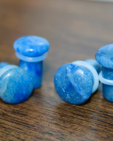 These Sodalite Single Flared Plugs offer both natural beauty and grounding energy—perfect for those who want crystal vibes with a clean, polished look. Great for everyday wear or intentional styling.