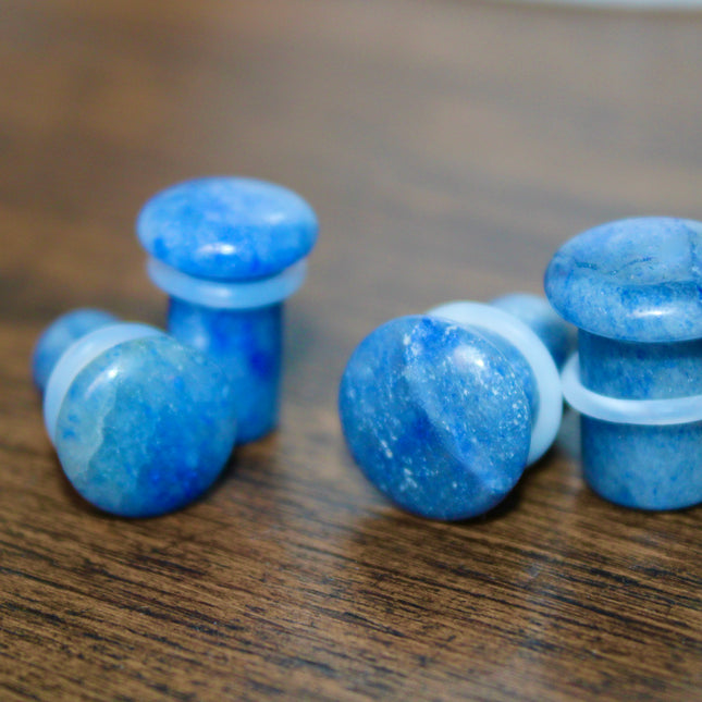 These Sodalite Single Flared Plugs offer both natural beauty and grounding energy—perfect for those who want crystal vibes with a clean, polished look. Great for everyday wear or intentional styling.