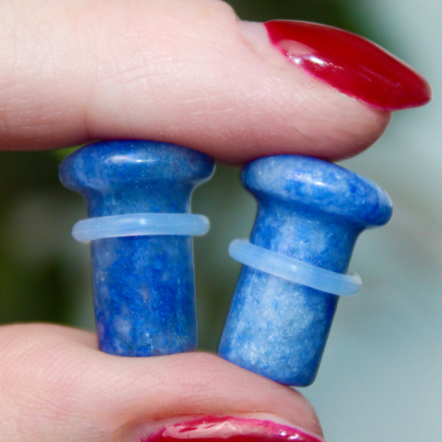 These Sodalite Single Flared Plugs offer both natural beauty and grounding energy—perfect for those who want crystal vibes with a clean, polished look. Great for everyday wear or intentional styling.