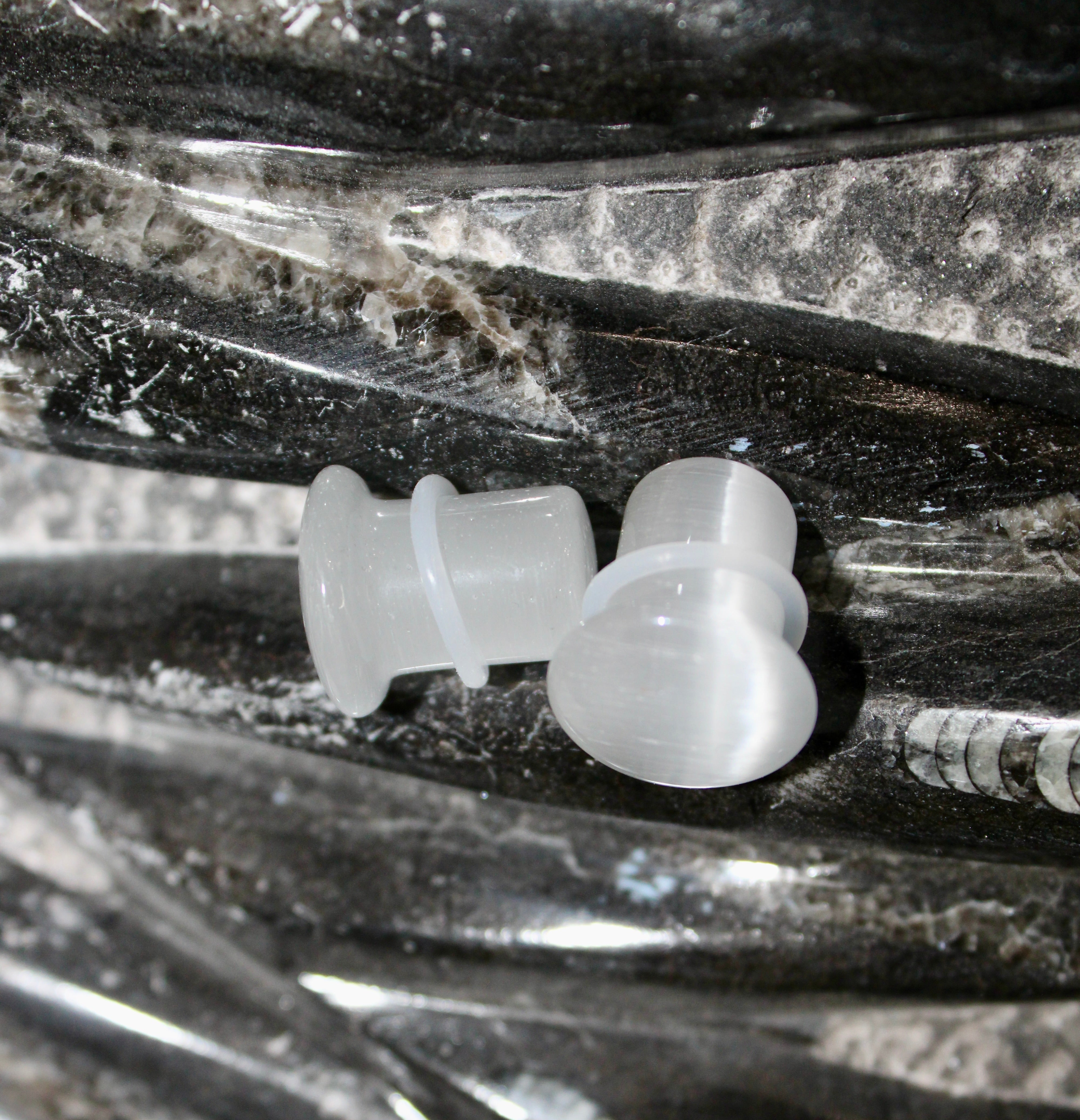 Chatoyant Line Silver Cat’s Eye glass is known for its sophisticated shimmer and ...