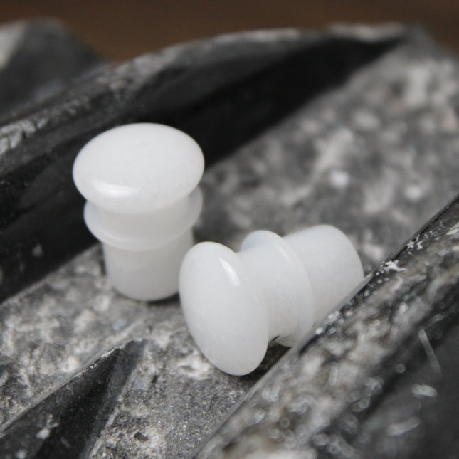 These White Quartz Single Flared Plugs combine subtle beauty with soothing energy—ideal for anyone seeking a minimalist look with meaningful crystal benefits.