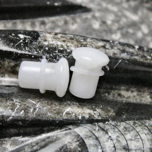 These White Quartz Single Flared Plugs combine subtle beauty with soothing energy—ideal for anyone seeking a minimalist look with meaningful crystal benefits.